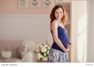 Home portrait of pregnant woman