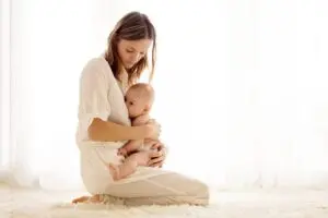 woman breastfeeding baby