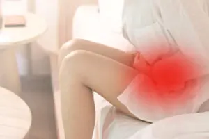 woman experiencing painful menstrual symptoms 