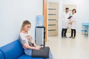 young woman waiting for doctor