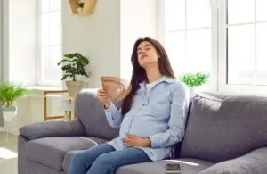 pregnant woman on the couch.