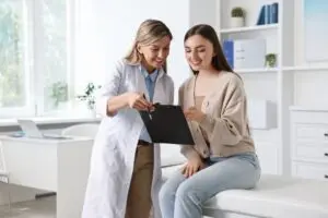 doctor talking to patient.